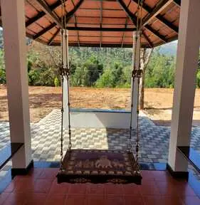 Traditional swing on the veranda